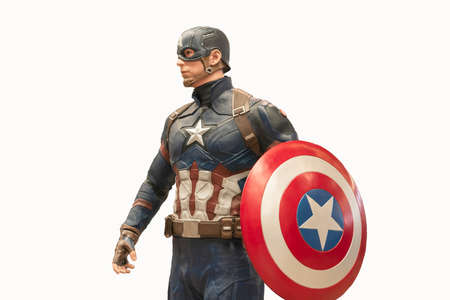 Valladolid, Spain - march 8, 2020 : Captain America model sit down is isolated on white background. Captain America is a fictional superhero in Marvel Comics.のeditorial素材