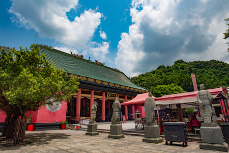 HONG KONG, CHINA - August 6, 2015 : View of The ancient chinese temple Che Kung Temple under cloudy sky on Aug 6, 2015 in Hong Kongのeditorial素材
