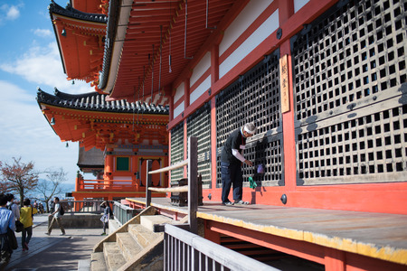 Kyoto, Japan - November 6, 2015: Old man cleaning and maintenance at Kiyomizu-dera temple in Kyoto, Japanのeditorial素材