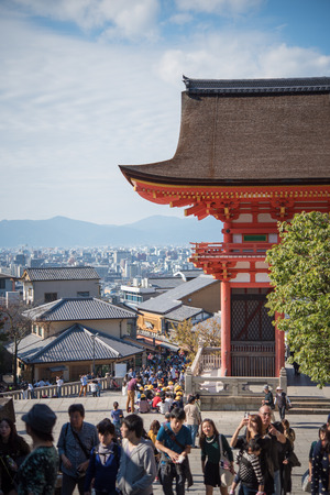 Kyoto, Japan - November 6, 2015: Tourists walk on a street around Kiyomizu Temple. Kiyomizu is a famous temple in Kyoto built in year 778. The temple is part of the Historic Monuments of Ancient Kyotoのeditorial素材