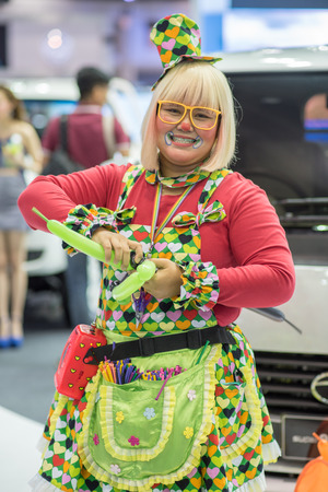 Bangkok, Thailand - December 3, 2015 : Unidentified funny girl that make childern happy  at Thailand International Motor Expo 2015 MOTOR EXPO 2015 on december 3, 2015 in Bangkok, Thailand.のeditorial素材