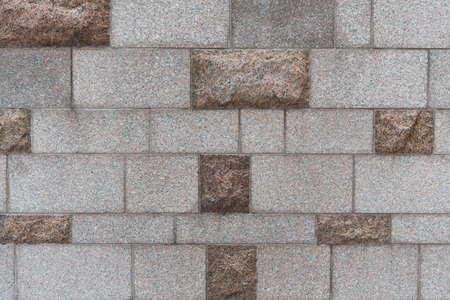 Square gray brick wall backgroundの写真素材