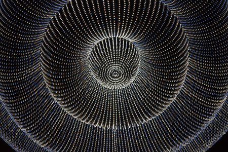 Close up of giant crystal chandelier in the shape of circle loopの写真素材