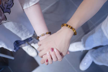 On holiday afternoons, couples wear couple bracelets that symbolize sweet love