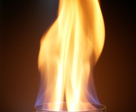 Flame background getting out of a glassの写真素材