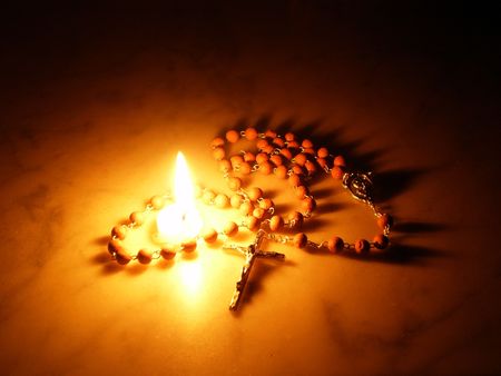 Candle and Rosaryの写真素材