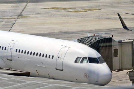 Airplane in the airportの写真素材