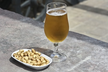 Beer and peanutsの写真素材