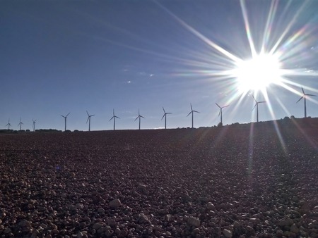 Sunshine over the windmillsの写真素材