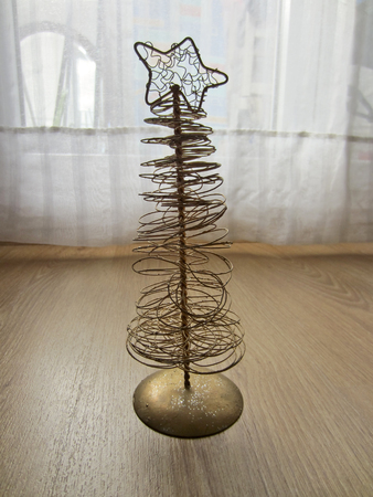 Golden Christmas tree with a starの写真素材