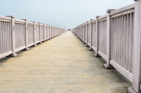 Long Road and pink railing