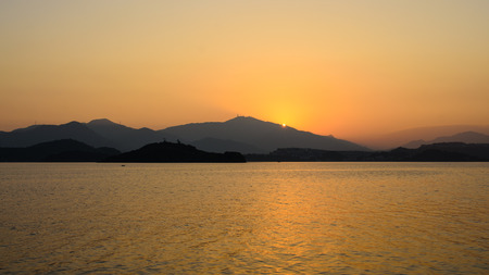 The silhouette of mountain and seaの写真素材