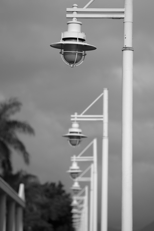 Lighthouse and lamppostsの写真素材