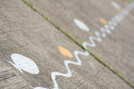 painting on groundの写真素材