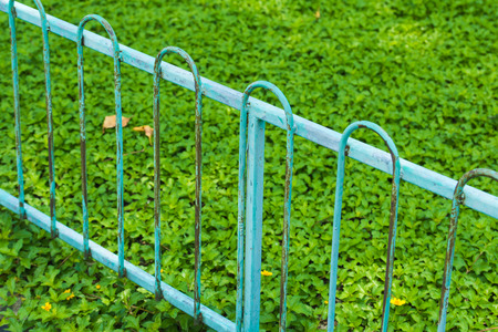 Blue fence on glass backgroundの写真素材