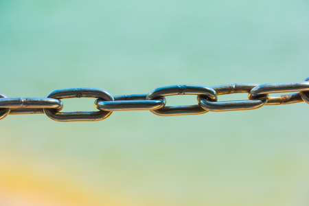 Chains with sea background, close upの写真素材