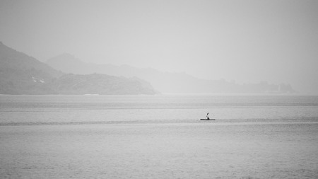 Silent Sea and paddleboard: Monochromeの写真素材