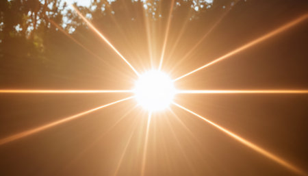 Sun rays and lens flare effect. Sun rays with lens flare.の素材