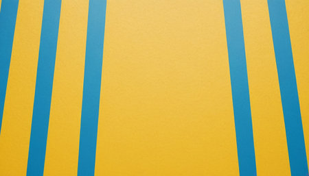 Blue and yellow striped background. Minimal style. Flat lay, top view.の素材