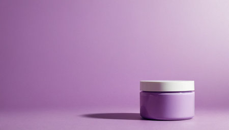 Jar of cosmetic cream on purple background with shadow. Mockup.の素材