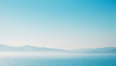 Beautiful landscape of sea and mountains on blue sky background with copy spaceの素材