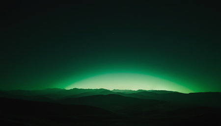 Aurora borealis, northern lights over a mountain range.の素材