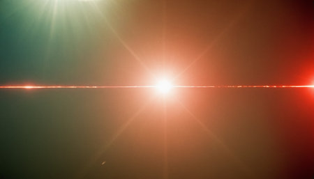 Sun burst with lens flare. Natural sun flare on the black background.の素材
