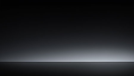 Empty black studio room with a spotlight on the wall. 3D renderingの素材