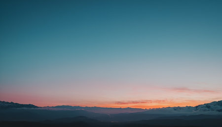 Beautiful sunset in the mountains. Panoramic view of the mountains.の素材