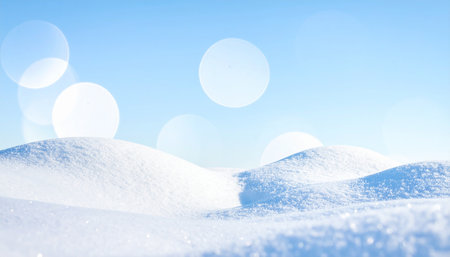 Winter background with snowdrift and bokeh in blue skyの素材