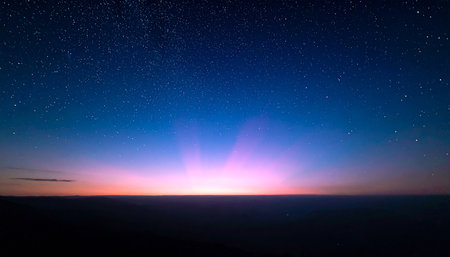 Beautiful night sky with stars and the Milky way above the mountainの素材