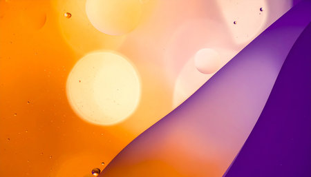 Water drops on the water surface with colorful background, close-upの素材