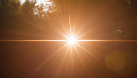 Sunrise with lens flare effect. Abstract natural sunbeams.の素材