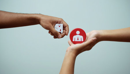 Hands of people holding playing cards. Focus on poker chip.の素材
