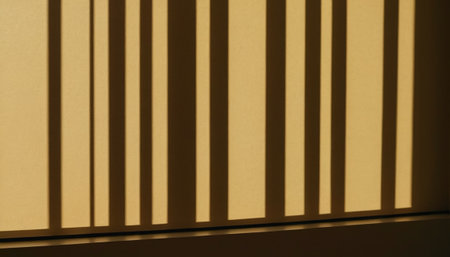 Shadow of blinds on the wall. Abstract background for design.の素材