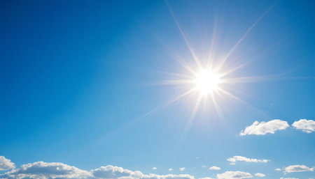 blue sky background with white clouds and sun, beautiful photo digital pictureの素材