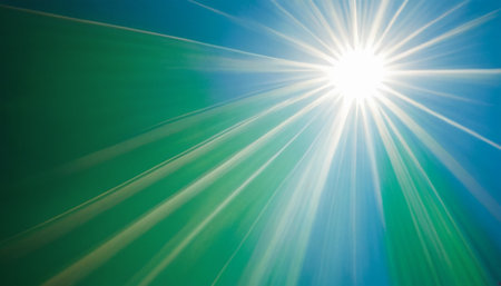 sunlight on a blue sky background, abstract photo with lens flareの素材