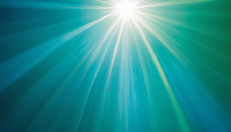 Abstract blue background with sunbeams and lens flare. Texture.の素材