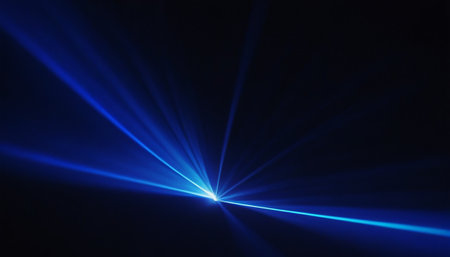 Blue rays of light in the dark. Computer generated abstract background.の素材