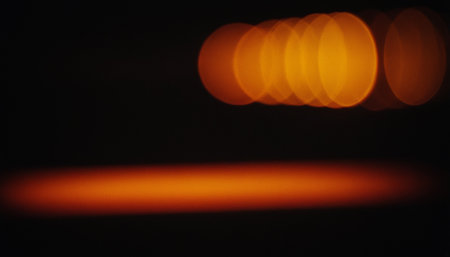 abstract bokeh light on black background,abstract backgroundの素材