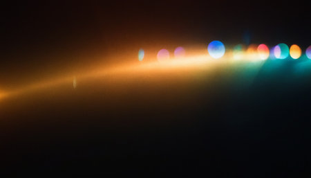 Colorful spotlights on a black background. Bokeh effect.の素材