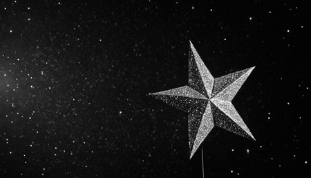 Christmas star made of silver glitter on a starry sky background.の素材