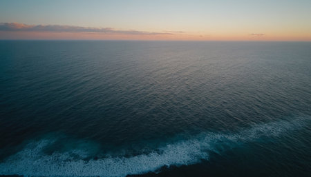 Aerial view of the sunset over the ocean. Drone photography.の素材