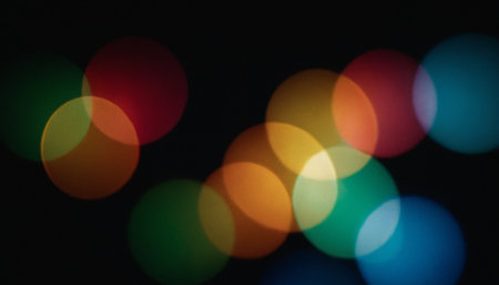 bokeh of colorful light on black background,abstract backgroundの素材
