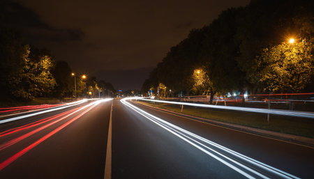 light trails on the street at night. long exposure photo taken in germanyの素材