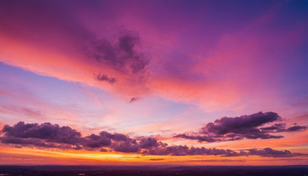 Colorful dramatic sky with cloud at sunset. Panoramic viewの素材
