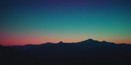 Silhouette of a mountain range at sunset. Toned.の素材