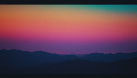 Colorful sunset on the mountain range. Silhouette of the mountains.の素材