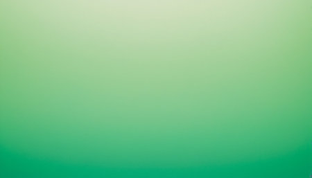 Green gradient abstract background. Blurred defocused lights background. Copy space.の素材