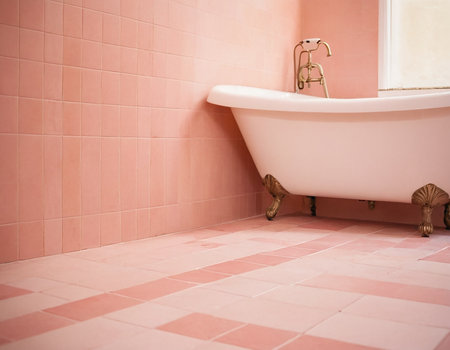 Bathroom with pink tile wall and white bathtub - Vintage Light Filterの素材